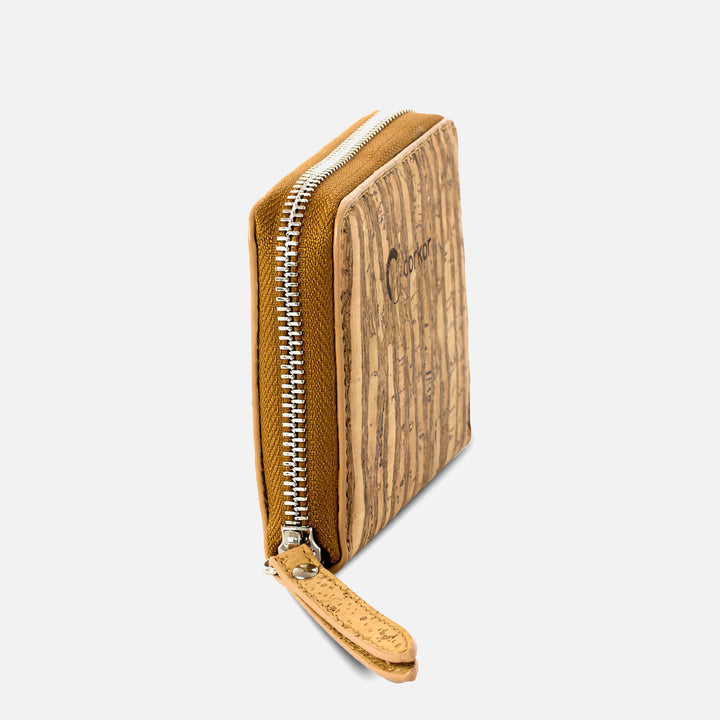 Corkor Zebra cork square wallet side view with zip-around closure and stitched pull tab