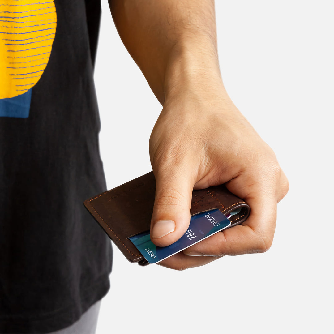 Effortlessly glide a card out of the exterior card slot with a single finger. Smooth and convenient card access.