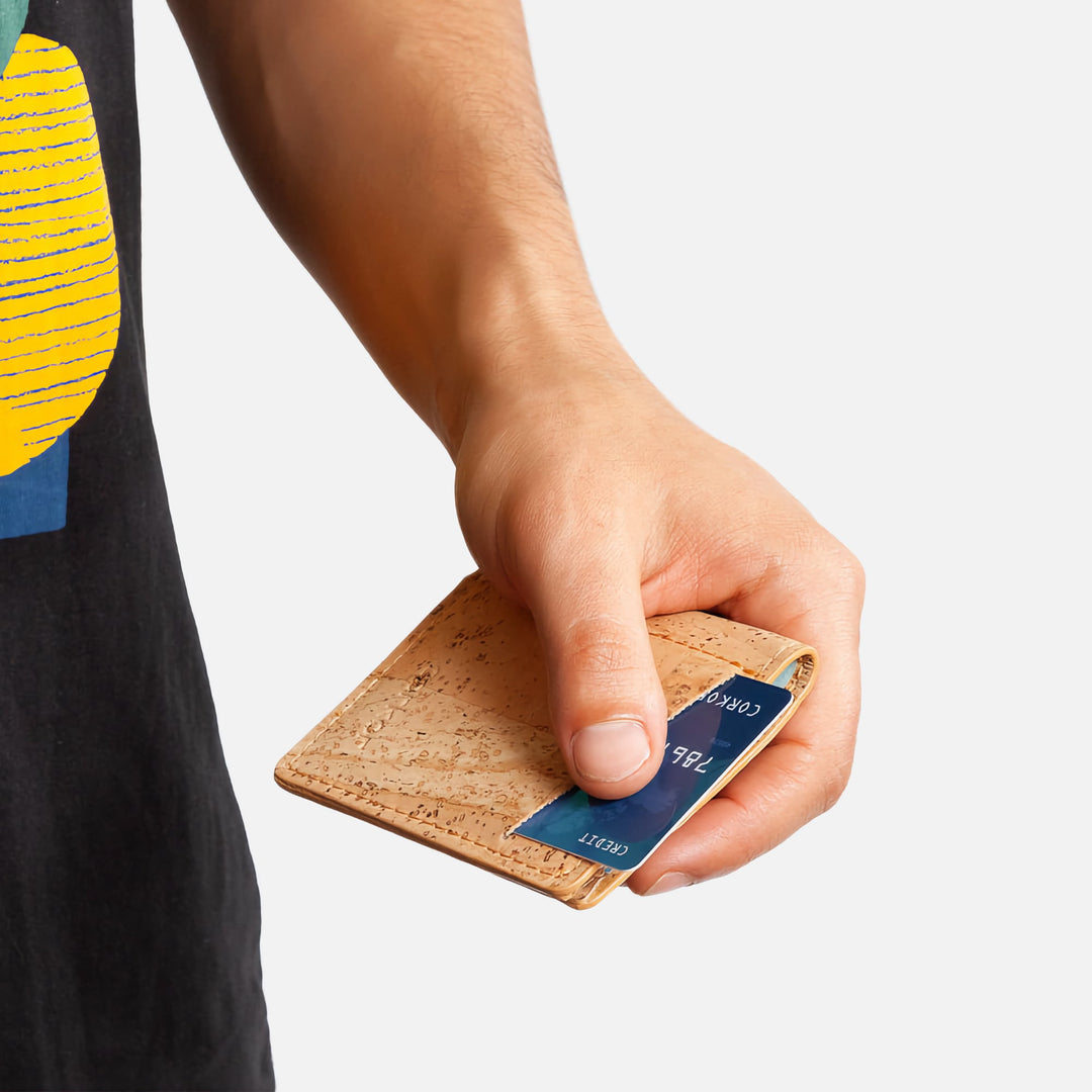 Effortlessly glide a card out of the exterior card slot with a single finger. Smooth and convenient card access.