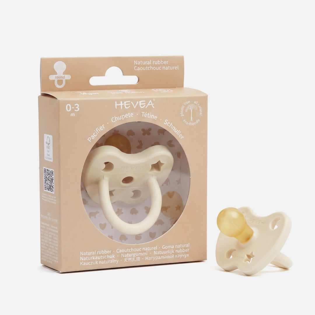 Hevea milky white natural rubber round pacifier 0–3 m with packaging and product