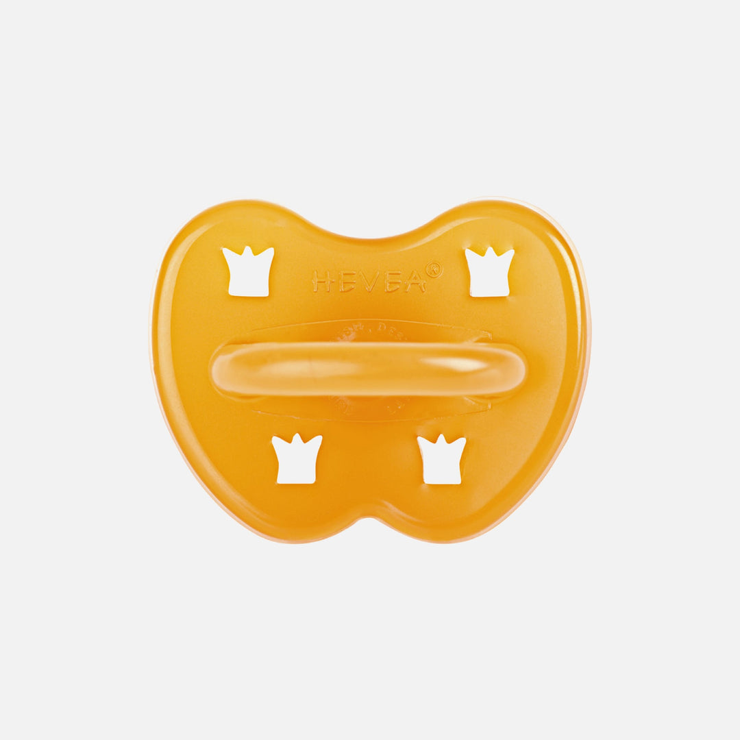 Hevea natural rubber pacifier in natural amber color with butterfly shield and crown ventilation holes