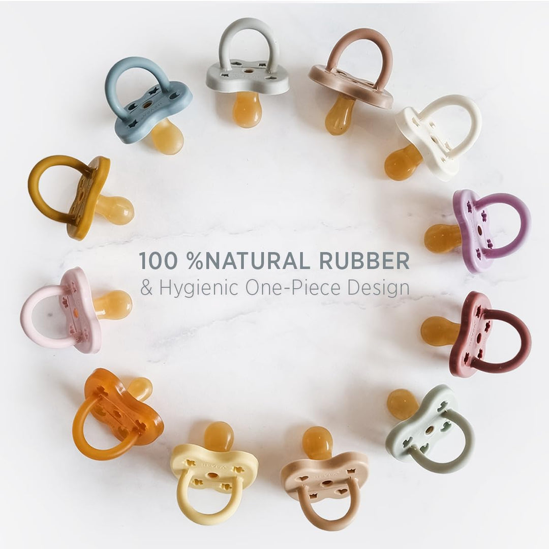 Assorted Hevea natural rubber pacifiers showing 100% natural rubber and one-piece design