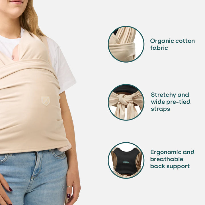 Close-up of the Koala Cuddle Band 2 baby sling carrier in beige, highlighting its organic cotton fabric, stretchy pre-tied straps, and ergonomic back support.