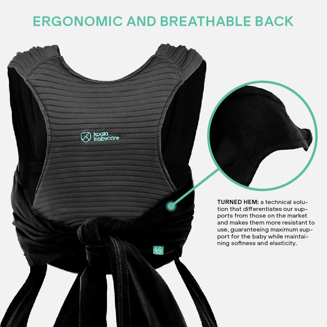 Close-up of the Koala Cuddle Band 2 baby wrap carrier in black, highlighting its ergonomic and breathable back support with reinforced stitching.