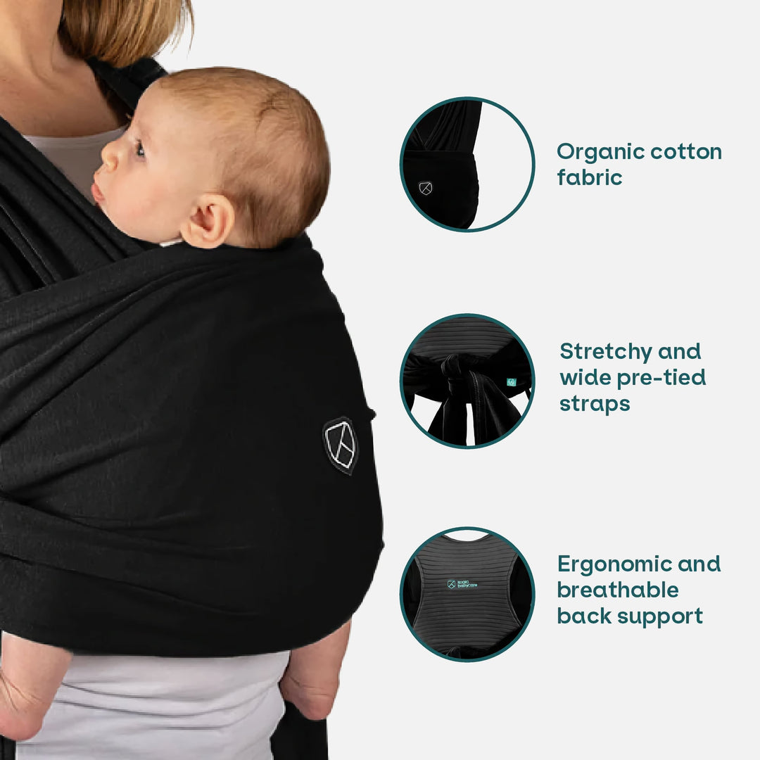 Koala Cuddle Band 2 baby wrap in black, featuring organic cotton fabric, stretchy pre-tied straps, and ergonomic breathable back support.