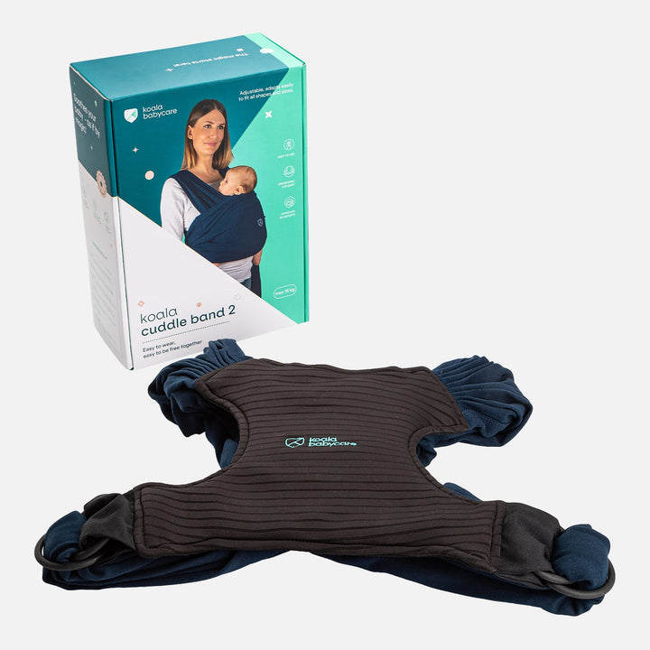 Koala Cuddle Band 2 in dark blue shown with product box and ergonomic back support laid flat for display