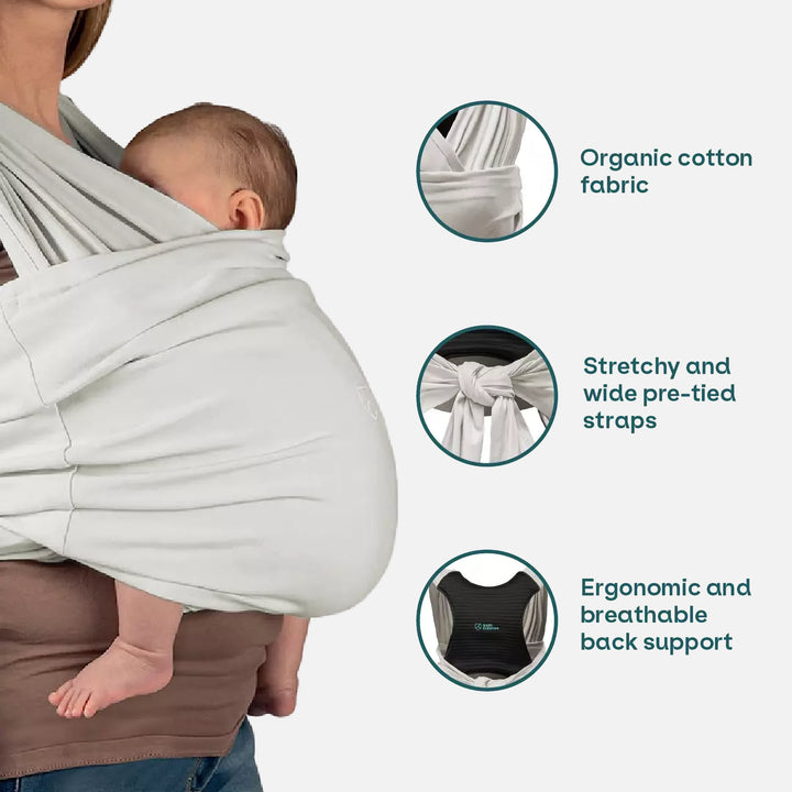 Close-up of the Koala Cuddle Band 2 baby sling carrier, highlighting its organic cotton fabric, wide pre-tied straps, and ergonomic back support.