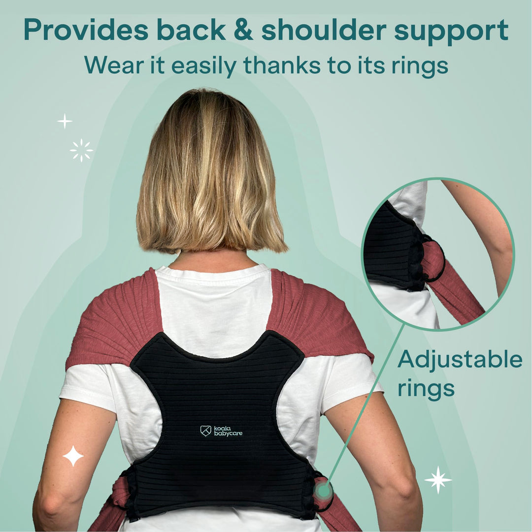 Koala Babycare Koala Cuddle Band in bordeaux, showing back and shoulder support with adjustable rings for a custom fit.