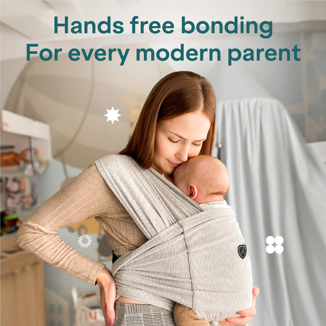 Mother using Koala Babycare Koala Cuddle Band in light gray, offering hands-free bonding for modern parents with ergonomic support.