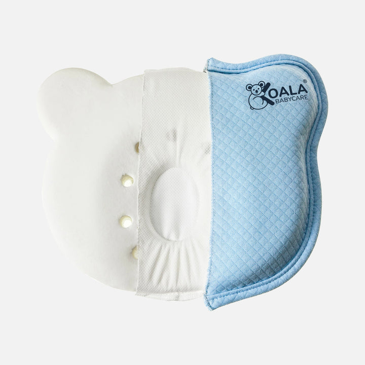 Koala Babycare Koala Perfect Head pillow in light blue with exposed inner memory foam structure and ergonomic central indent.