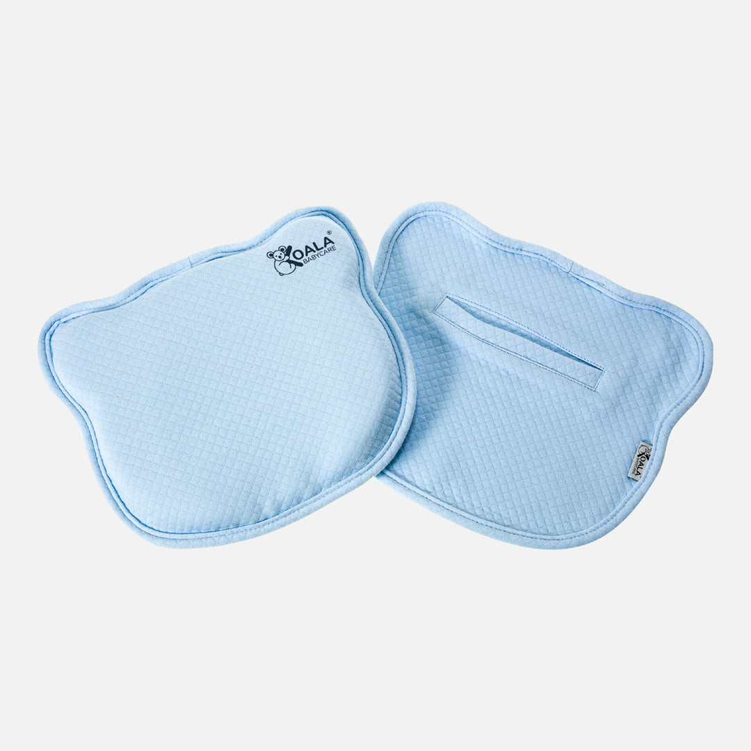 Koala Babycare Koala Perfect Head pillow in light blue with removable, machine-washable cover, designed for ergonomic newborn support.