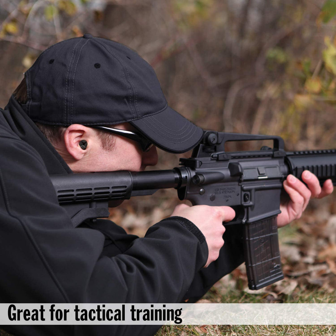 Shooter wearing Mack's Covert Ops Soft Foam Shooting Earplugs during tactical training for NRR 32 dB hearing protection