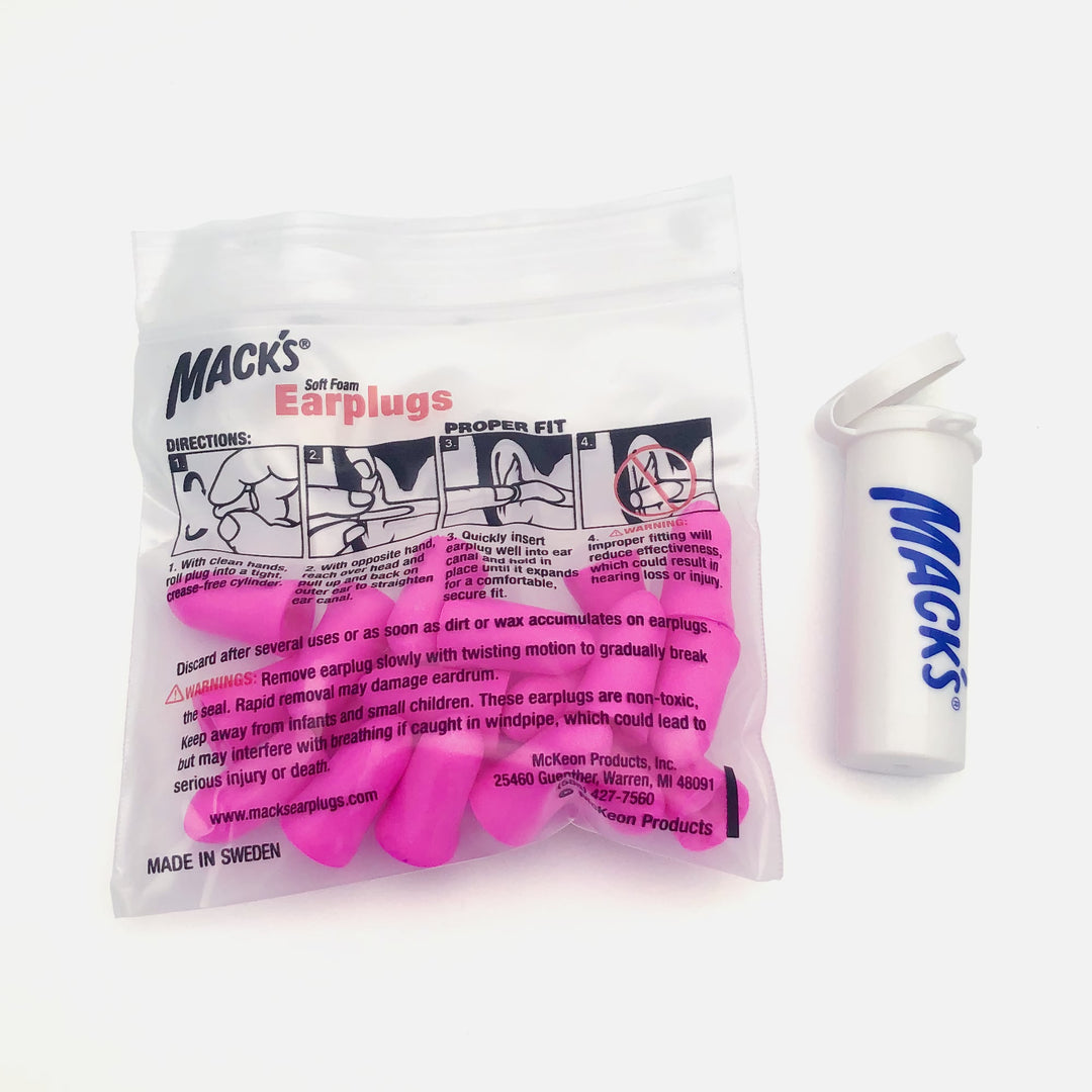 Mack's Dreamgirl Soft Foam Earplugs package contents, including 10 pairs of pink earplugs and a white travel case.