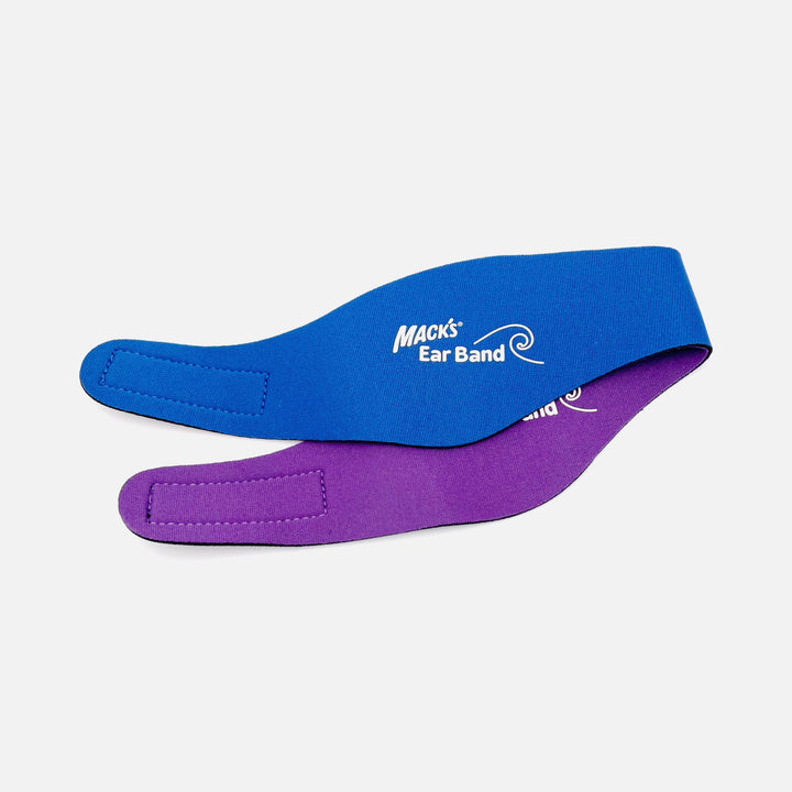Mack's reversible blue and purple neoprene swimming headband shown flat with adjustable closure