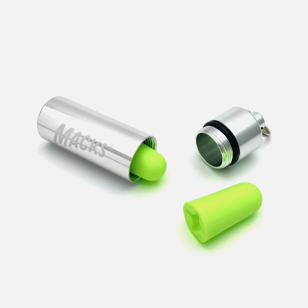 Mack's Hi Viz Soft Foam Earplug with aluminum travel case NRR 32dB fluorescent yellow-green close-up