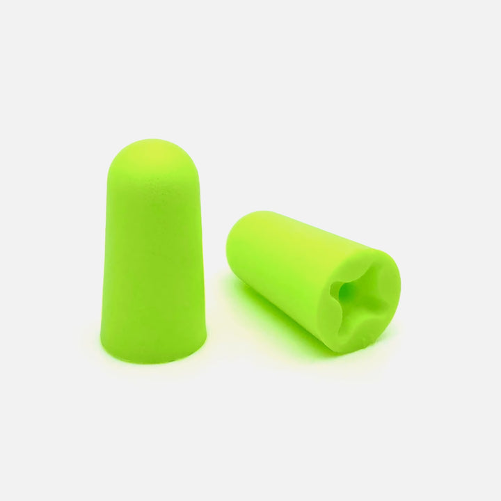 Mack's Hi Viz Soft Foam Earplugs NRR 32dB in ANSI fluorescent yellow-green close-up detail
