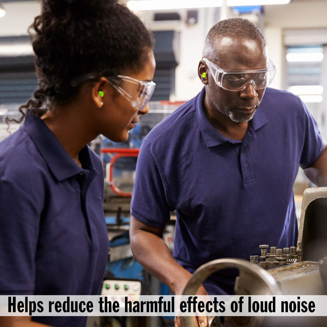 Workers wearing Mack's Hi Viz Soft Foam Earplugs NRR 32dB in industrial workshop environment