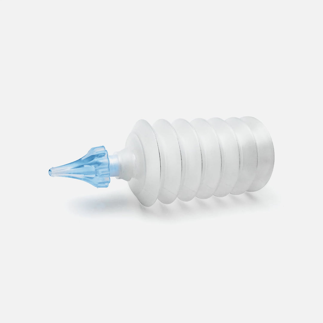 Mack's ProRinse earwax removal syringe with tri-stream blue safety tip and white bulb design