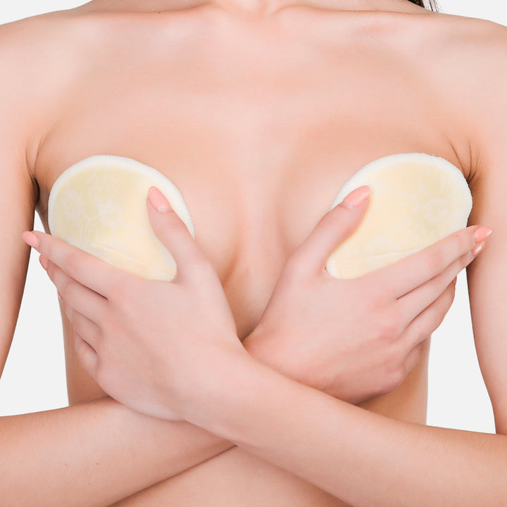 NatureBond Elegance reusable laced bamboo cotton nursing pads worn on skin with 3D contoured fit