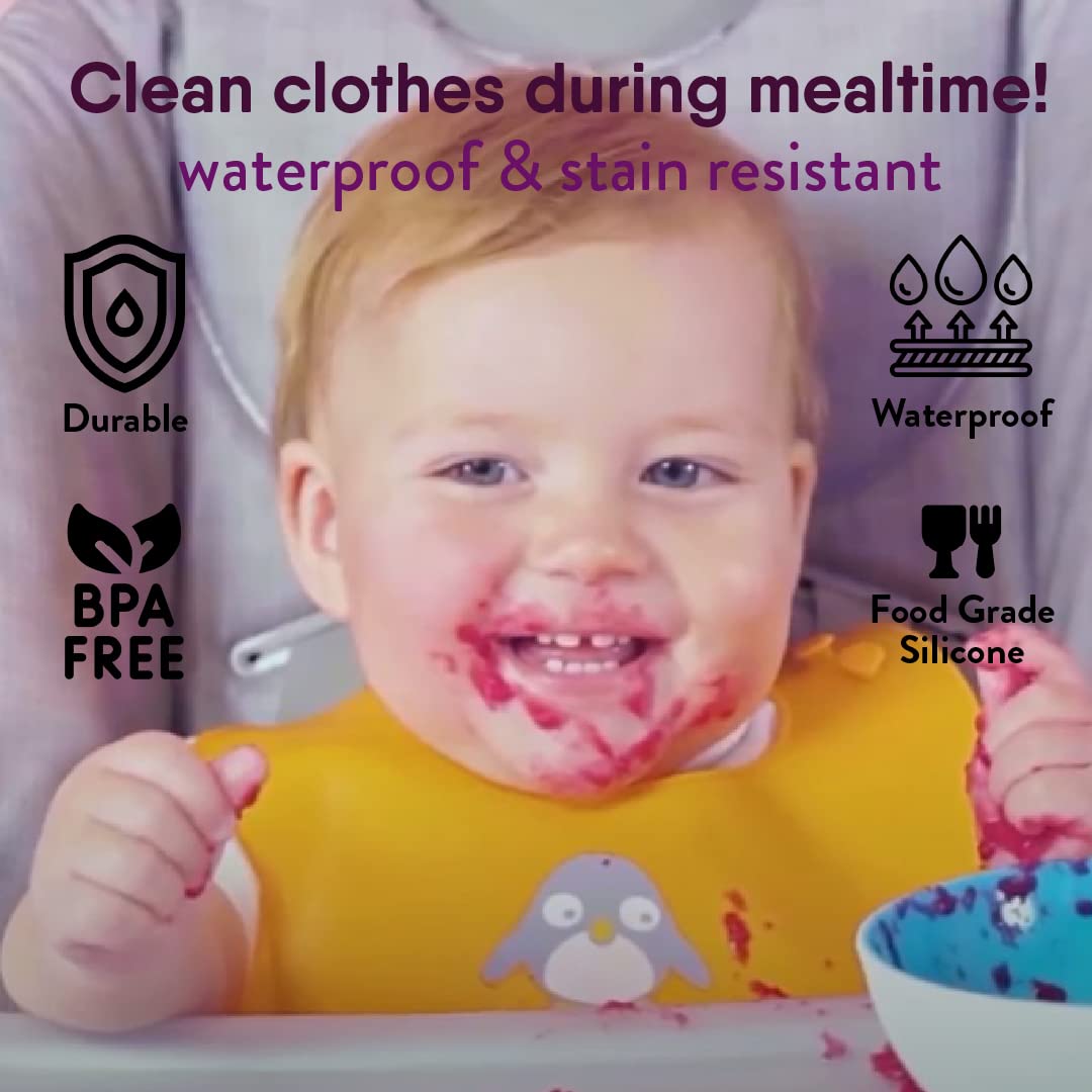 Baby wearing NatureBond silicone bib during messy feeding, waterproof and stain resistant, food grade BPA-free material keeps clothes clean