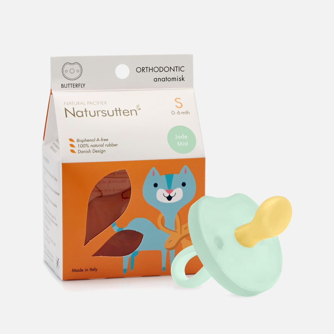 Natursutten Natural Rubber Butterfly Orthodontic Pacifier in Jade Mist with eco-friendly packaging and Danish design.