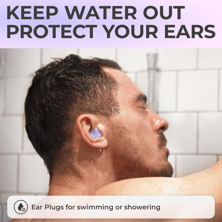 PQ Wax Ear Plugs lavender moldable earplug worn by a man while showering, illustrating water protection