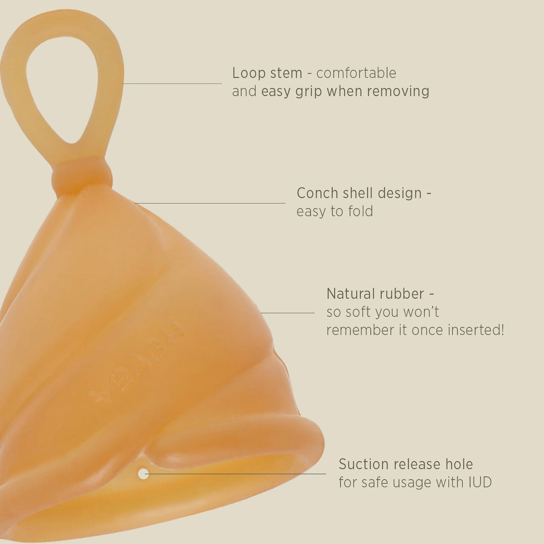 Hevea Loop Menstrual Cup design features including soft loop stem, conch shell design, natural rubber, and suction release hole.